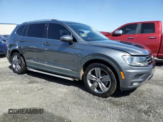 2020 Volkswagen Tiguan SE z VIN 3VV3B7AX8LM102502, wystawiony jako Copart lot #52428635 z przebiegiem 50 778 mil mil oraz Szkody całkowita. Historia ofert i sprzedaży dostępna na DreamBid. Obrazek 4.
