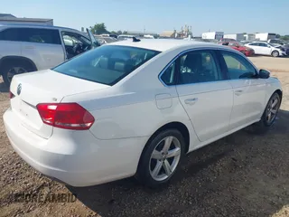 2012 Volkswagen Passat SE with VIN 1VWBH7A32CC091887, listed as a IAAI auction lot 41996295 with 163,011 mi miles. Bid and sale history available at carsss.com. Image 4.