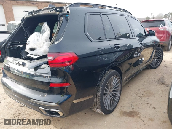 2021 BMW X7 M50i with VIN 5UXCX6C07M9G39230, listed as a IAAI auction lot 41409366 with 63,965 mi miles. Bid and sale history available at carsss.com. Image 4.