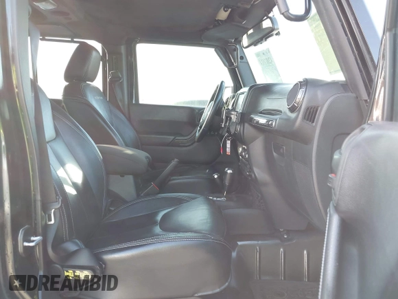 2015 Jeep Wrangler Unlimited Rubicon Hard Rock with VIN 1C4HJWFG7FL602344, listed as a IAAI auction lot 42011914 with 109,238 mi miles and . Bid and sale history available at DreamBid. Image 5.