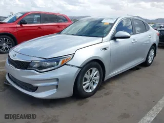 2016 Kia Optima LX with VIN KNAGT4L34G5111504, listed as a IAAI auction lot 41955031 with 80,727 mi miles. Bid and sale history available at carsss.com. Image 2.