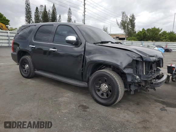 2012 Chevrolet Tahoe Commercial with VIN 1GNLC2E05CR303999, listed as a Copart auction lot 55617295 with 148,326 mi miles and Salvage title. Bid and sale history available at DreamBid. Image 4.