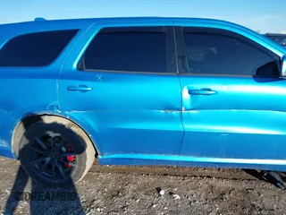 2018 Dodge Durango SRT z VIN 1C4SDJGJ1JC415720, wystawiony jako IAAI lot #41193674 z przebiegiem 63 140 mil mil oraz . Historia ofert i sprzedaży dostępna na DreamBid. Obrazek 19.