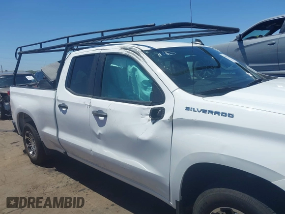 2021 Chevrolet Silverado 1500 Work Truck with VIN 1GCRWAEF9MZ122334, listed as a IAAI auction lot 39596264 with 27,876 mi miles and . Bid and sale history available at DreamBid. Image 6.