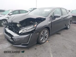 2018 Honda Clarity z VIN JHMZC5F15JC009223, wystawiony jako IAAI lot #41626369 z przebiegiem 46 014 mil mil oraz . Historia ofert i sprzedaży dostępna na DreamBid. Obrazek 18.