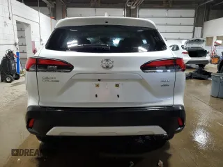 2023 Toyota Corolla Cross XLE with VIN 7MUDAABG9PV074996, listed as a Copart auction lot 47436105 with 21,766 mi miles and Salvage title. Bid and sale history available at DreamBid. Image 6.