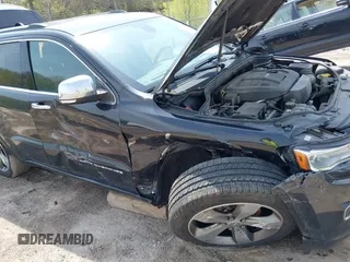 2016 Jeep Grand Cherokee Overland with VIN 1C4RJFCG5GC343752, listed as a IAAI auction lot 42138080 with 86,777 mi miles and . Bid and sale history available at DreamBid. Image 6.