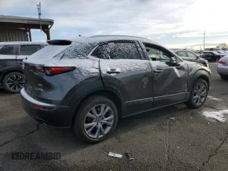 2020 Mazda CX-30 Premium z VIN 3MVDMBEM9LM127150, wystawiony jako Copart lot #51527295 z przebiegiem 27 207 mil mil oraz Szkoda całkowita • Salvage title. Historia ofert i sprzedaży dostępna na DreamBid. Obrazek 3.