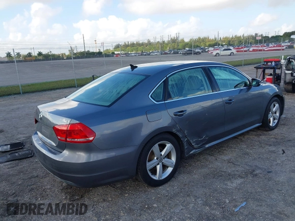2013 Volkswagen Passat SE w/Sunroof & Nav with VIN 1VWBP7A35DC038217, listed as a IAAI auction lot 41944193 with 102,767 mi miles. Bid and sale history available at carsss.com. Image 4.