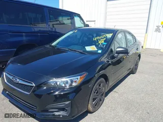 2019 Subaru Impreza with VIN 4S3GKAA66K3624212, listed as a IAAI auction lot 42070474 with 112,951 mi miles. Bid and sale history available at carsss.com. Image 2.