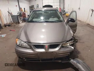 2002 Pontiac Grand Am SE1 with VIN 1G2NF52FX2C128240, listed as a IAAI auction lot 41356415 with 15,900 mi miles. Bid and sale history available at carsss.com. Image 12.