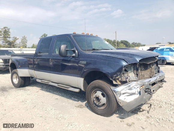 2001 Ford Super Duty F-350 DRW XL with VIN 1FTWW33FX1EB91067, listed as a Copart auction lot 68024904 with 272,132 mi miles and Salvage Title. Bid and sale history available at carsss.com. Image 4.