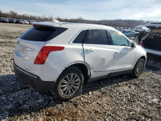 2017 Cadillac XT5 Luxury FWD with VIN 1GYKNBRS5HZ310995, listed as a Copart auction lot 43131695 with 156,817 mi miles and Salvage Title. Bid and sale history available at carsss.com. Image 3.