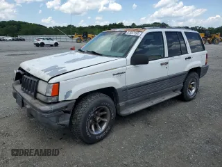 1995 Jeep Grand Cherokee Laredo с VIN 1J4GZ58S5SC724222, выставлен на аукционе Copart как лот 57837155 с пробегом 246 303 миль миль и Списание • Salvage title. История ставок и продаж доступна на DreamBid. Изображение 1.