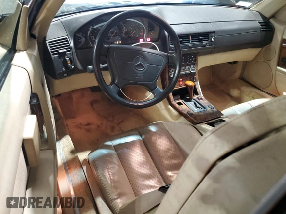 1992 Mercedes-Benz 500 z VIN WDBFA66E5NF040865, wystawiony jako Copart lot #57905205 z przebiegiem 95 158 mil mil oraz Tytuł czysty. Historia ofert i sprzedaży dostępna na DreamBid. Obrazek 8.