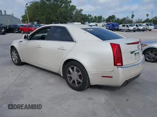 2008 Cadillac CTS RWD with VIN 1G6DF577480176287, listed as a IAAI auction lot 41951925 with 211,628 mi miles and . Bid and sale history available at DreamBid. Image 3.