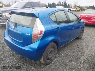 2013 Toyota Prius c One with VIN JTDKDTB39D1058324, listed as a IAAI auction lot 41916103 with 68,079 mi miles. Bid and sale history available at carsss.com. Image 4.