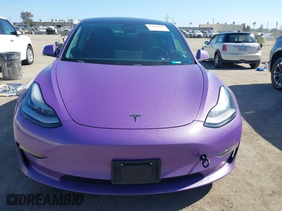 2020 Tesla Model 3 Standard Range Plus with VIN 5YJ3E1EA0LF739462, listed as a IAAI auction lot 42081889 with 65,254 mi miles. Bid and sale history available at carsss.com. Image 12.