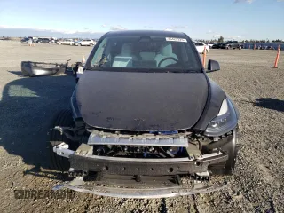 2024 Tesla Model Y Long Range with VIN 7SAYGDEE8RF002655, listed as a Copart auction lot 46422325 with 7,943 mi miles and Salvage Title. Bid and sale history available at DreamBid. Image 5.