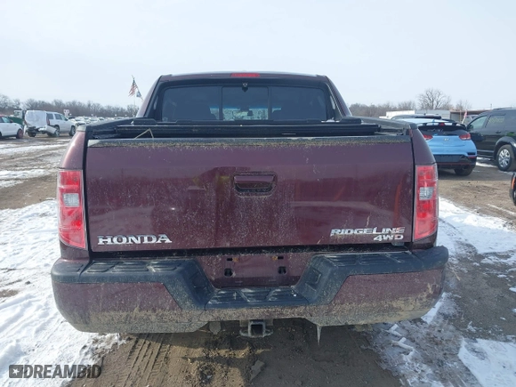 2011 Honda Ridgeline RTL with VIN 5FPYK1F58BB004573, listed as a IAAI auction lot 41576676 with 56,120 mi miles. Bid and sale history available at carsss.com. Image 16.