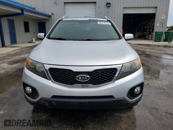 2012 Kia Sorento EX z VIN 5XYKU4A27CG229651, wystawiony jako Copart lot #60314715 z przebiegiem 117 876 mil mil oraz Szkoda całkowita • Salvage title. Historia ofert i sprzedaży dostępna na DreamBid. Obrazek 5.