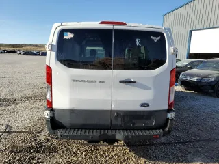 2017 Ford Transit z VIN 1FTYE1YM4HKA73728, wystawiony jako Copart lot #59231565 z przebiegiem 169 458 mil mil oraz Czysty tytuł • Clean title. Historia ofert i sprzedaży dostępna na DreamBid. Obrazek 8.