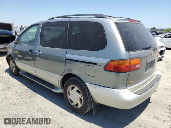1998 Toyota Sienna LE with VIN 4T3ZF13C4WU064791, listed as a Copart auction lot 61411865 with 218,835 mi miles and Salvage title. Bid and sale history available at DreamBid. Image 2.
