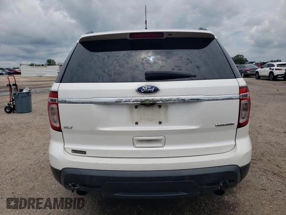 2014 Ford Explorer XLT z VIN 1FM5K7D8XEGA22459, wystawiony jako Copart lot #63042695 z przebiegiem 216 612 mil mil oraz Szkoda całkowita • Salvage title. Historia ofert i sprzedaży dostępna na DreamBid. Obrazek 6.