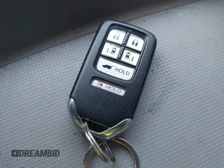 2014 Honda Odyssey EX-L z VIN 5FNRL5H69EB095297, wystawiony jako IAAI lot #42299438 z przebiegiem 126 841 mil mil oraz . Historia ofert i sprzedaży dostępna na DreamBid. Obrazek 11.