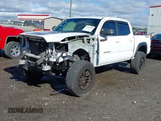 2020 Toyota Tacoma SR5 with VIN 3TMAZ5CN4LM132002, listed as a IAAI auction lot 41224844 with 55,000 mi miles and . Bid and sale history available at DreamBid. Image 18.