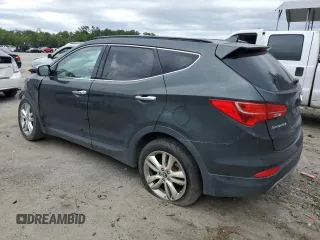 2013 Hyundai Santa Fe Sport z VIN 5XYZUDLAXDG082486, wystawiony jako Copart lot #68941974 z przebiegiem Nie podano mil oraz Szkoda całkowita • Salvage title. Historia ofert i sprzedaży dostępna na DreamBid. Obrazek 2.