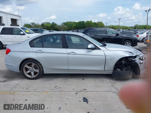 2013 BMW 3 Series 328i with VIN WBA3C1C59DK105001, listed as a IAAI auction lot 41923155 with 73,810 mi miles. Bid and sale history available at carsss.com. Image 14.