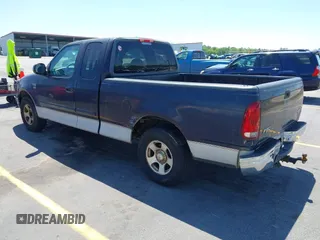 1999 Ford F-150 with VIN 1FTRX17W9XNB32397, listed as a IAAI auction lot 42048746 with 290,179 mi miles and . Bid and sale history available at DreamBid. Image 3.