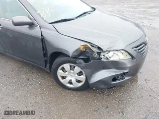 2007 Toyota Camry CE with VIN 4T1BE46K77U688152, listed as a IAAI auction lot 41799406 with 152,033 mi miles. Bid and sale history available at carsss.com. Image 6.