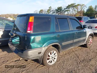 1998 Honda CR-V EX with VIN JHLRD1868WC043795, listed as a IAAI auction lot 39225234 with 194,732 mi miles. Bid and sale history available at carsss.com. Image 4.