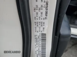 2011 Jeep Grand Cherokee Laredo with VIN 1J4RR4GG9BC515467, listed as a Copart auction lot 58411085 with 112,558 mi miles and Salvage title. Bid and sale history available at DreamBid. Image 13.
