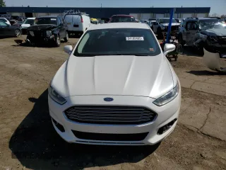 2015 Ford Fusion SE Hybrid with VIN 3FA6P0LU7FR154952, listed as a Copart auction lot 54192465 with 490,431 mi miles and Clean Title. Bid and sale history available at carsss.com. Image 5.