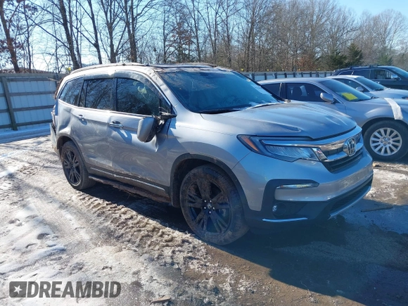 2021 Honda Pilot Elite with VIN 5FNYF6H02MB000114, listed as a IAAI auction lot 41256199 with 65,165 mi miles. Bid and sale history available at carsss.com. Image 1.