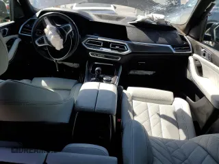 2023 BMW X5 xDrive45e with VIN 5UXTA6C06P9R89208, listed as a Copart auction lot 50352635 with 0 mi miles and Salvage Title. Bid and sale history available at carsss.com. Image 8.