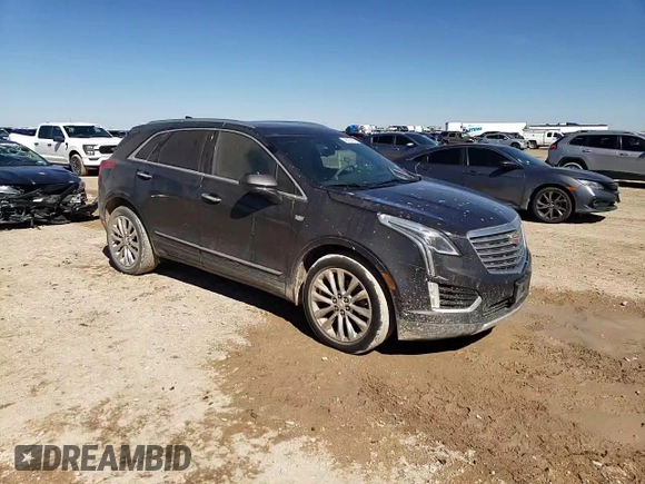 2017 Cadillac XT5 Platinum AWD z VIN 1GYKNFRS6HZ138810, wystawiony jako Copart lot #48029455 z przebiegiem 97 948 mil mil oraz Szkoda całkowita • Salvage title. Historia ofert i sprzedaży dostępna na DreamBid. Obrazek 12.