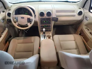 2005 Ford Freestyle SEL z VIN 1FMDK02135GA60009, wystawiony jako Copart lot #52852755 z przebiegiem 248 780 mil mil oraz Szkody całkowita. Historia ofert i sprzedaży dostępna na DreamBid. Obrazek 8.