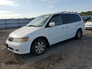 2004 Honda Odyssey EX-L z VIN 5FNRL18024B096178, wystawiony jako Copart lot #56003535 z przebiegiem 303 456 mil mil oraz Szkoda całkowita • Salvage title. Historia ofert i sprzedaży dostępna na DreamBid. Obrazek 1.