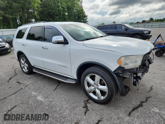 2013 Dodge Durango Citadel with VIN 1C4RDHEG6DC658958, listed as a Copart auction lot 60304945 with 209,250 mi miles and Salvage title. Bid and sale history available at DreamBid. Image 4.