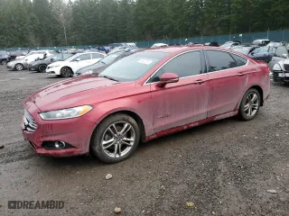 2016 Ford Fusion Titanium Hybrid with VIN 3FA6P0RU7GR187877, listed as a Copart auction lot 88923615 with 76,322 mi miles and Salvage Title. Bid and sale history available at carsss.com. Image 1.