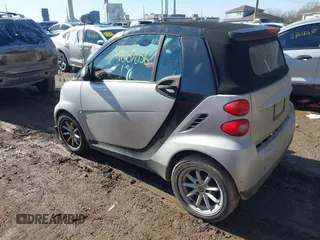 2009 Smart fortwo Passion z VIN WMEEK31X99K301253, wystawiony jako IAAI lot #41667056 z przebiegiem 176 021 mil mil oraz . Historia ofert i sprzedaży dostępna na DreamBid. Obrazek 3.