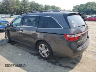 2013 Honda Odyssey Touring with VIN 5FNRL5H93DB017932, listed as a Copart auction lot 60112165 with 110,761 mi miles and Salvage title. Bid and sale history available at DreamBid. Image 2.