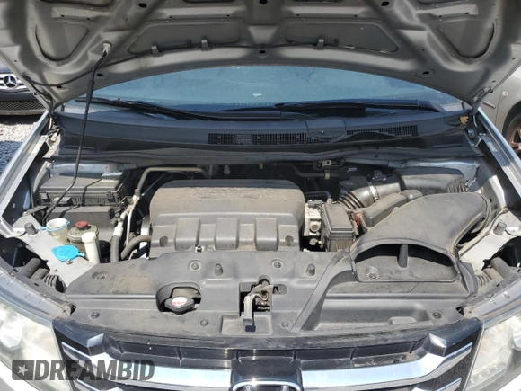 2014 Honda Odyssey EX-L with VIN 5FNRL5H63EB042207, listed as a Copart auction lot 61957605 with 204,563 mi miles and Salvage title. Bid and sale history available at DreamBid. Image 12.
