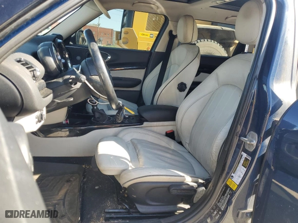 2017 MINI Clubman Cooper S with VIN WMWLU5C51H2E81530, listed as a Copart auction lot 76809344 with 111,814 mi miles and Clean Title. Bid and sale history available at carsss.com. Image 7.