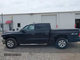 2004 Dodge Dakota SLT z VIN 1D7HG48N54S664848, wystawiony jako IAAI lot #42152635 z przebiegiem 153 824 mil mil oraz . Historia ofert i sprzedaży dostępna na DreamBid. Obrazek 14.