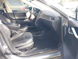 2014 Tesla Model S 60 with VIN 5YJSA1H18EFP38078, listed as a IAAI auction lot 42748619 with 159,285 mi miles and . Bid and sale history available at DreamBid. Image 5.